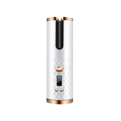 White and rose gold electronic device on a white background