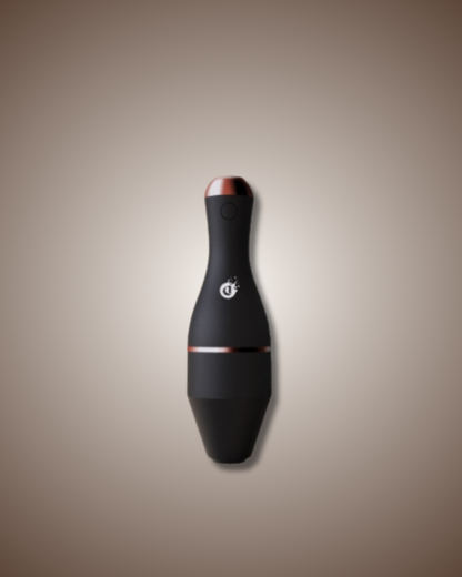 Black and red electronic device on a beige background