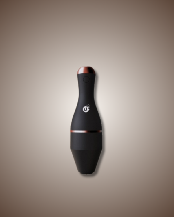 Black and red electronic device on a beige background